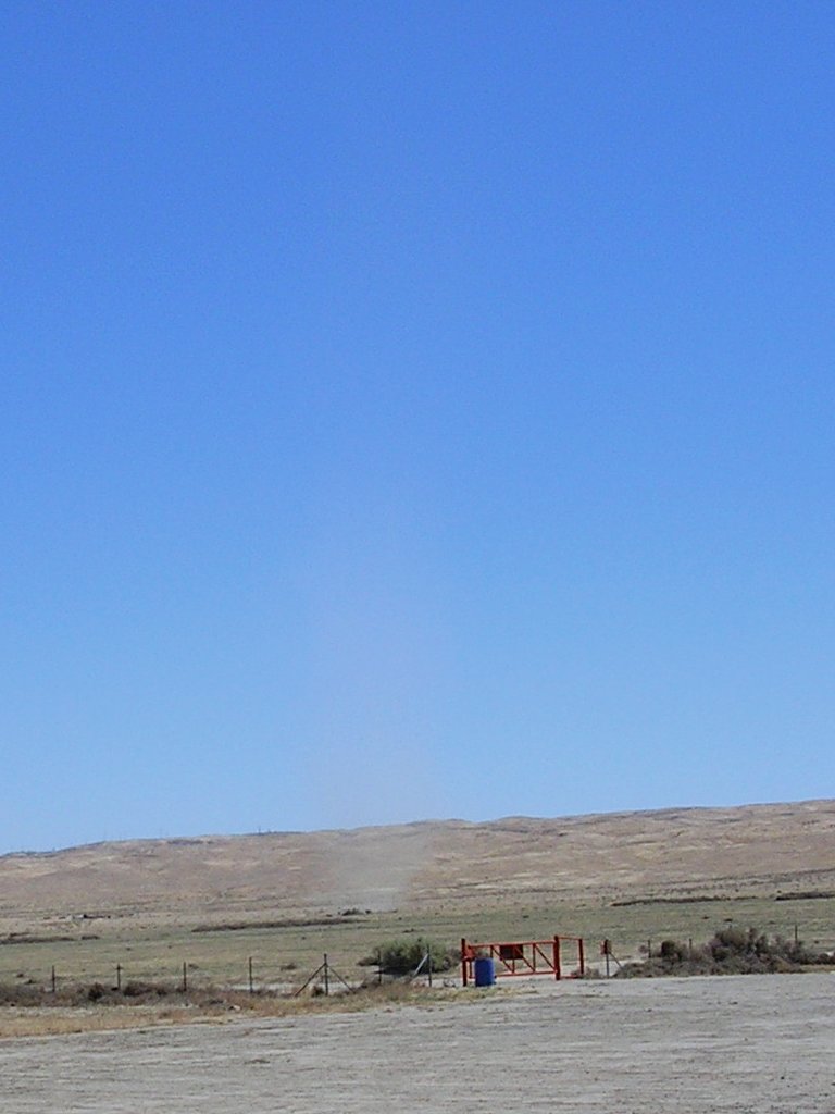 A dust devil (look for the tumbleweeds)